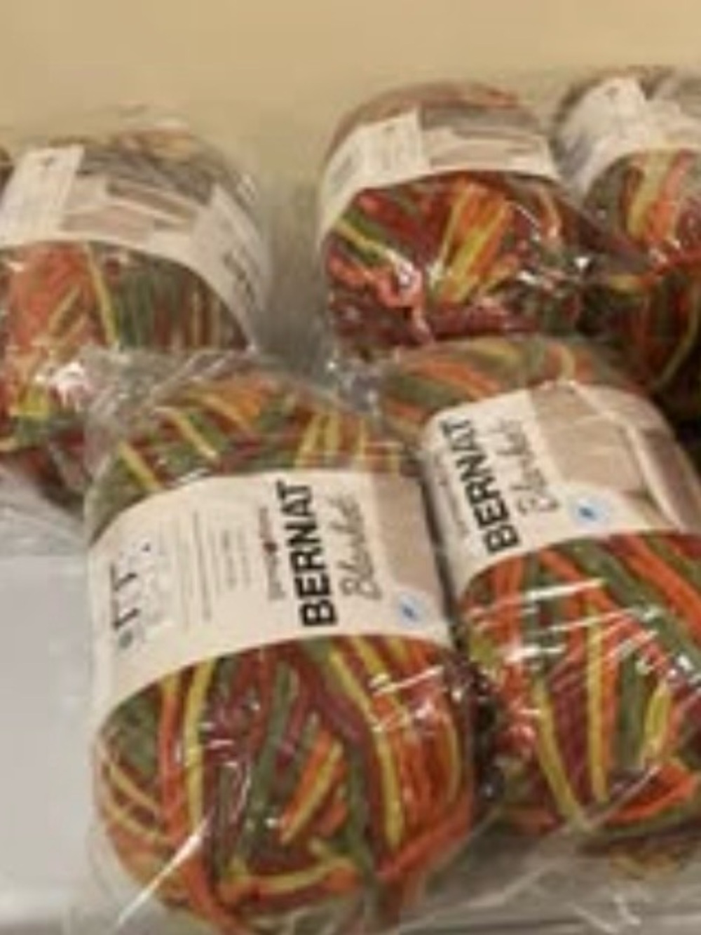 6 new Bernat Blanket yarn in the
"Harvest" colorway is a 100% polyester, super